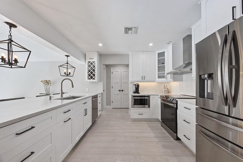 Photo of 682 W Camino Real, Boca Raton, FL 33486 (MLS # F10519426)