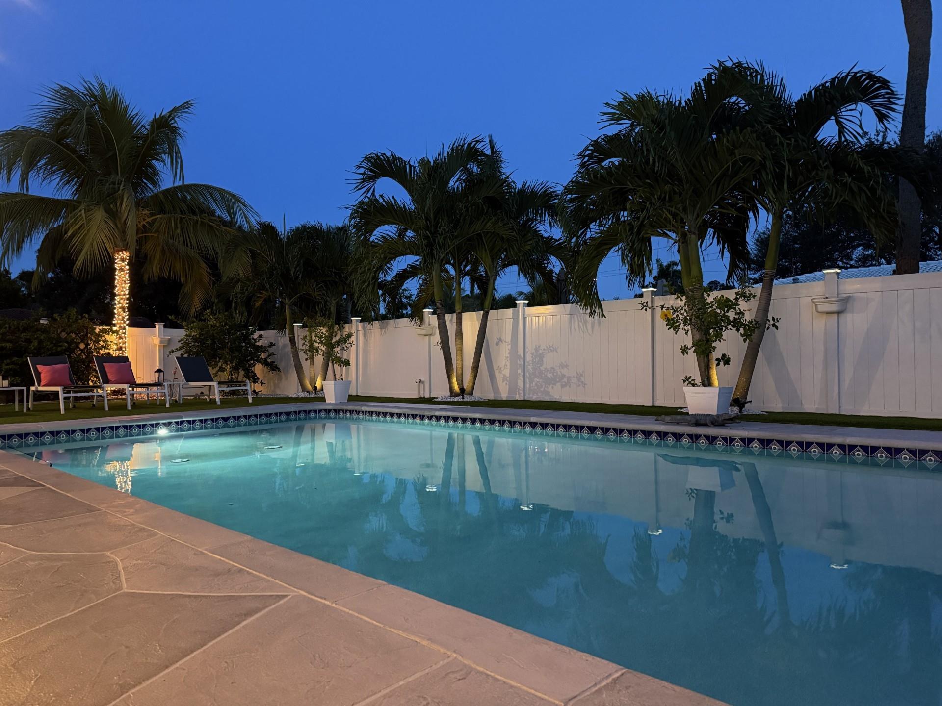 This meticulously maintained 3-bedroom, 3-bath corner residence offers the perfect blend of sophistication and convenience. Ideally located just minutes from pristine beaches, premier shopping, fine dining, and major highways, this home combines luxury living with everyday ease. Inside you'll find light-filled living spaces, refined finishes, sleek modern kitchen, and 3 beautifully appointed bathrooms. The open layout creates a seamless flow designed for both comfort and elegance. Outdoors, the lushly landscaped yard transforms into a private oasis, offering a serene retreat to relax, unwind, and enjoy the beauty of your surroundings. A rare opportunity to own a home that is as stylish as it is inviting, in one of the area’s most desirable locations.