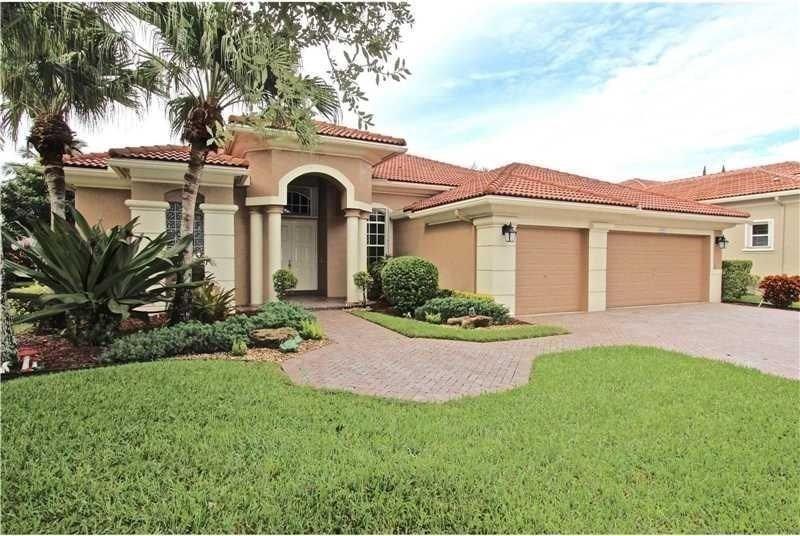 Incredible Bay Pointe Single Story Home on Market for first time! Excellent Condition and Prime location! Gorgeous gated community. Home with waterfront/ pool that will impress all! Triple Split Floor Plan can also double as mother in law quarters and optional office! Master Bedroom is large with excellent views and lots of closet space along with roman tub! Newer AC and Accordion Hurricane Shutters. Kitchen has granite counters and solid wood cabinets. Major price reduction! This one is a must see!