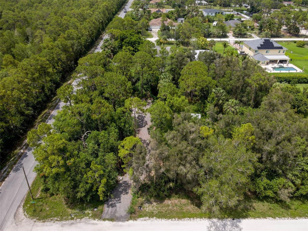 Photo of 17987 32nd Lane, Loxahatchee, FL 33470 (MLS # F10542210)