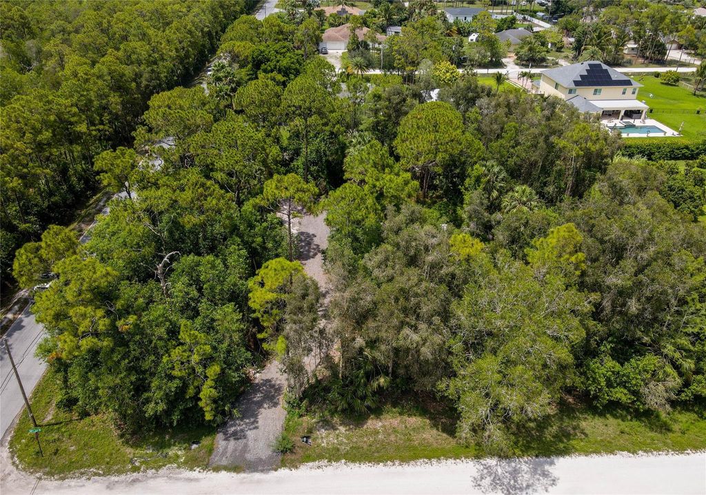 Photo of 17987 32nd Lane, Loxahatchee, FL 33470 (MLS # F10542210)