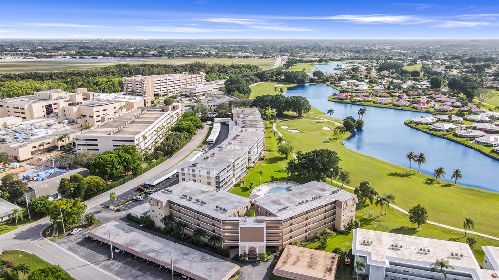 Lovely First Floor end unit for sale in the exclusive city of Atlantis! This quaint gated city is one of Florida's best kept secrets. It features 2 championship golf courses, a park, where residents gather to play tennis or enjoy community festivities and more. The unit itself boasts an updated kitchen, Hurricane impact windows and a screened in patio with a pool view. All this conveniently located close to the beaches, I-95 and in between major airports. Call for a private viewing today!