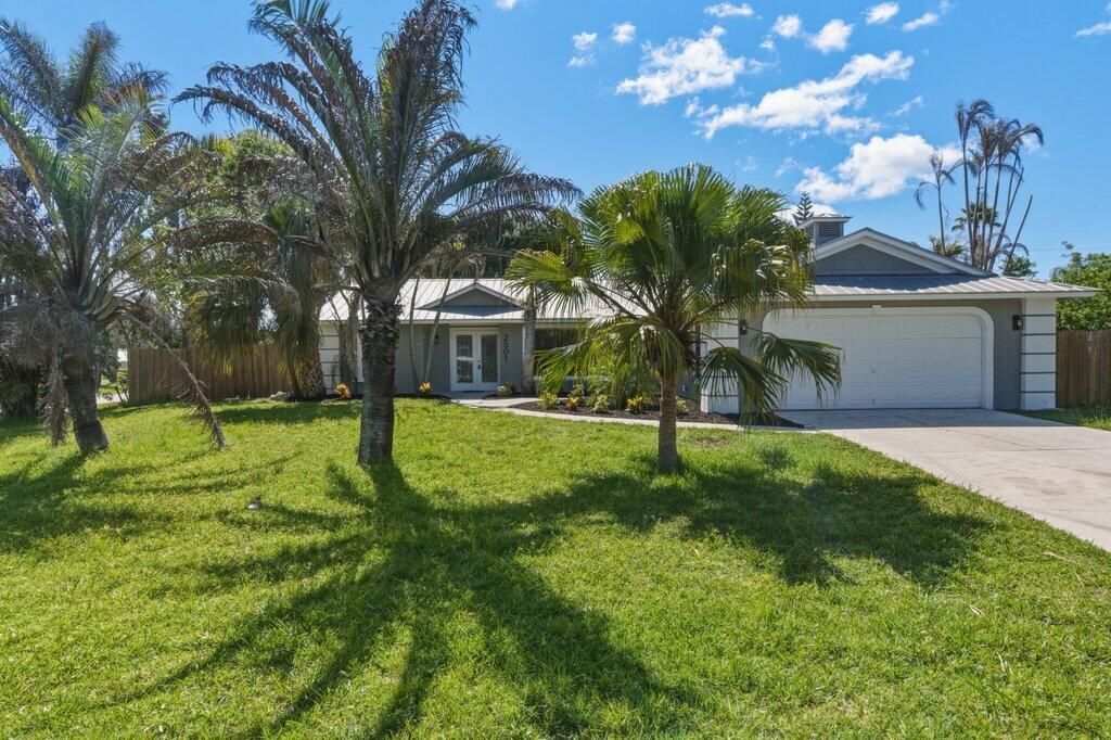 Photo of 2501 SE Marius Street, Port Saint Lucie, FL 34952 (MLS # B26039722)