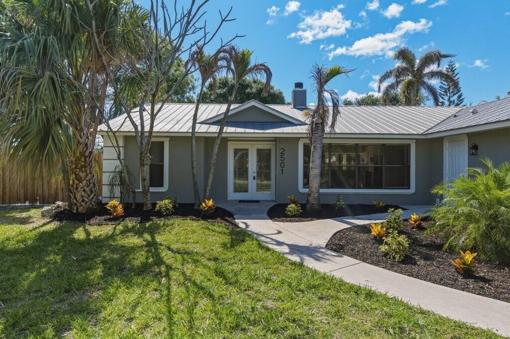 Photo of 2501 SE Marius Street, Port Saint Lucie, FL 34952 (MLS # B26039722)