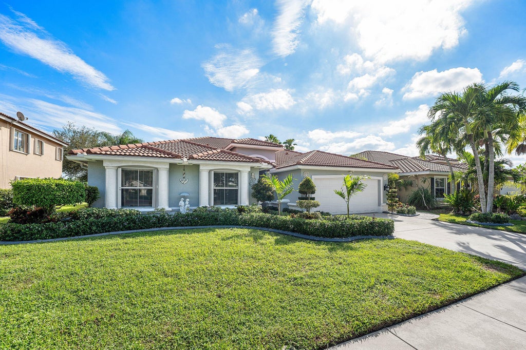 Photo of 5696 Muirfield Village Circle, Lake Worth, FL 33463 (MLS # B26088500)