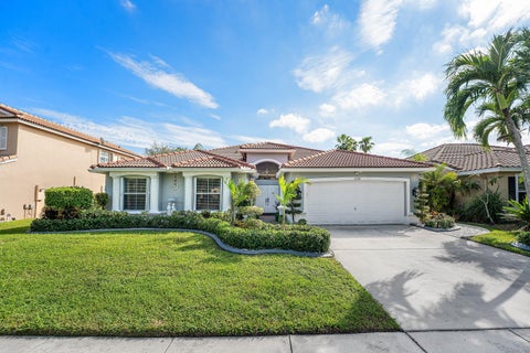 Photo of 5696 Muirfield Village Circle, Lake Worth, FL 33463 (MLS # B26088500)