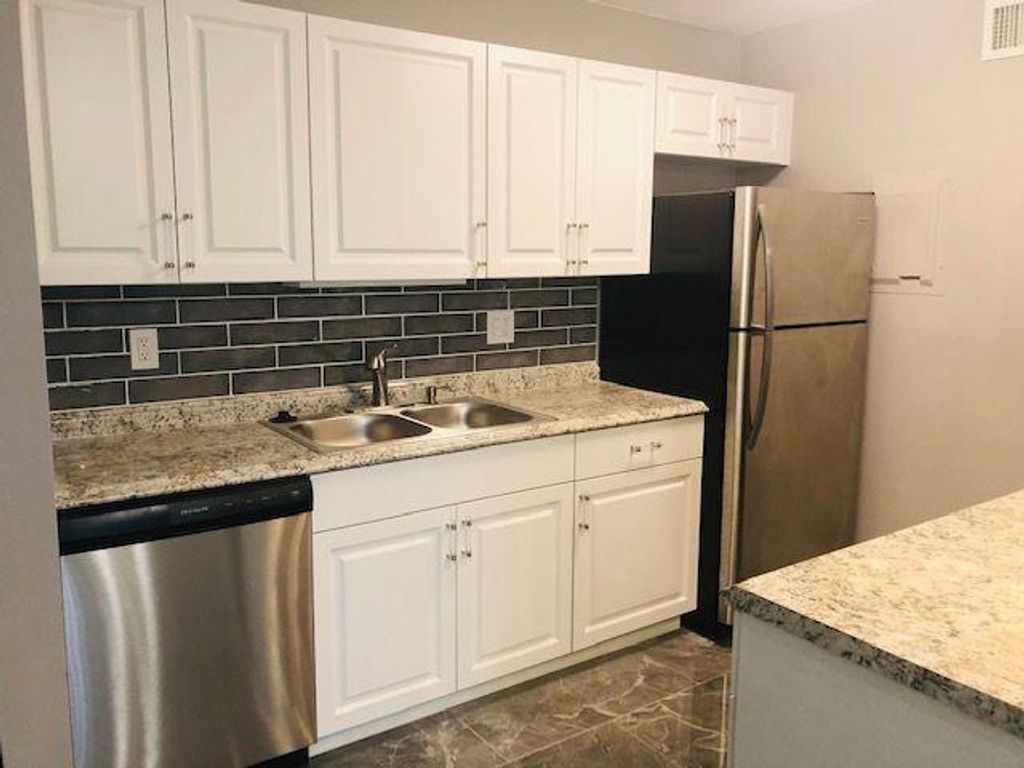 Photo of 643 Executive Center Drive #Q104, West Palm Beach, FL 33401 (MLS # F10455078)