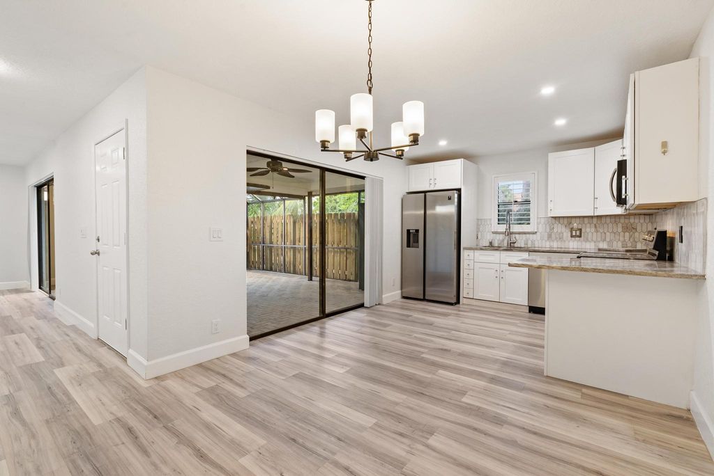 Photo of 7780 Courtyard Run W, Boca Raton, FL 33433 (MLS # B26023587)