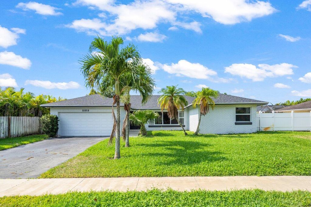 Photo of 11312 Chipmunk Drive, Boca Raton, FL 33428 (MLS # R10989606)