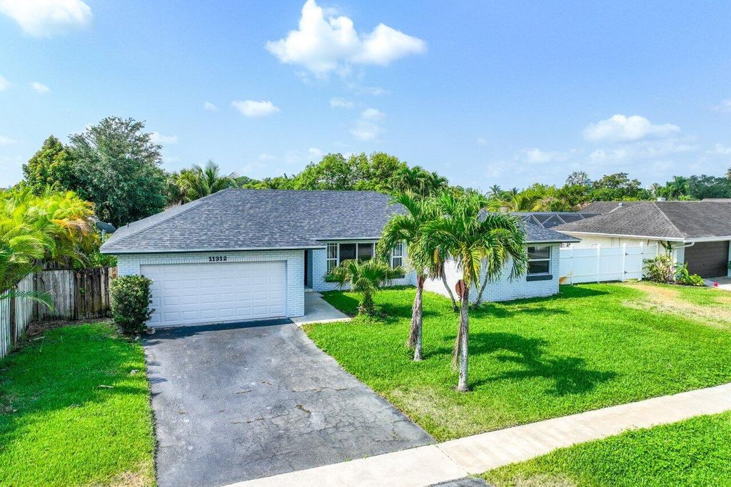 Photo of 11312 Chipmunk Drive, Boca Raton, FL 33428 (MLS # R10989606)