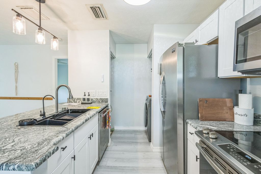 Photo of 6537 SE Federal Highway #202, Stuart, FL 34997 (MLS # R11094003)