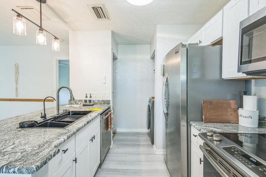 Photo of 6537 SE Federal Highway #202, Stuart, FL 34997 (MLS # R11094003)