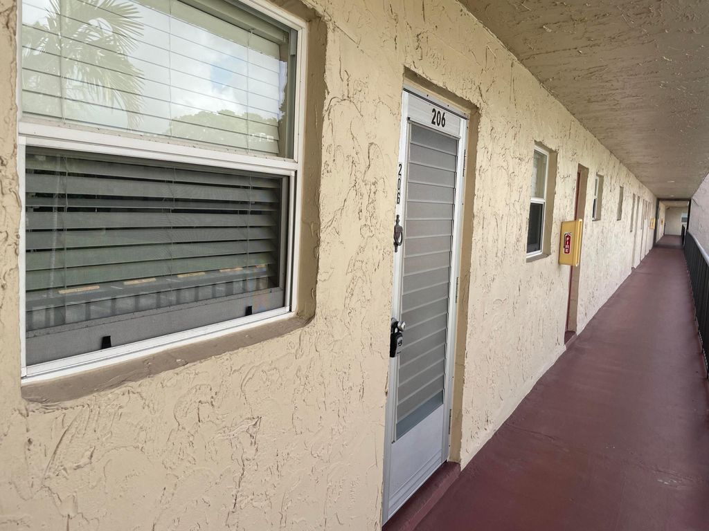 Photo of 705 Lori Drive #206, Palm Springs, FL 33461 (MLS # R11123050)