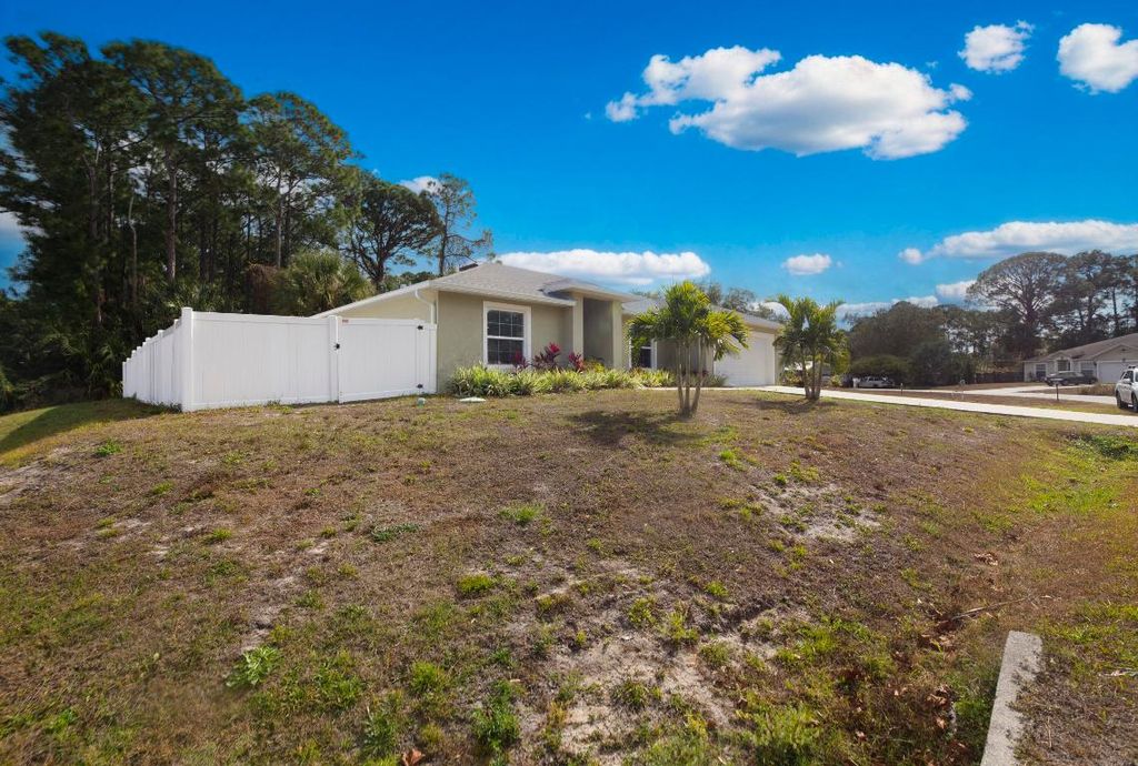 Photo of 587 Plumbago Road NW, Palm Bay, FL 32907 (MLS # R11157836)