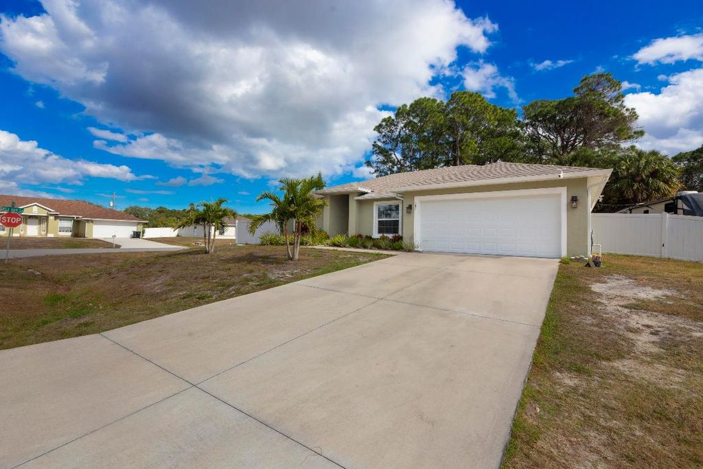 Photo of 587 Plumbago Road NW, Palm Bay, FL 32907 (MLS # R11157836)