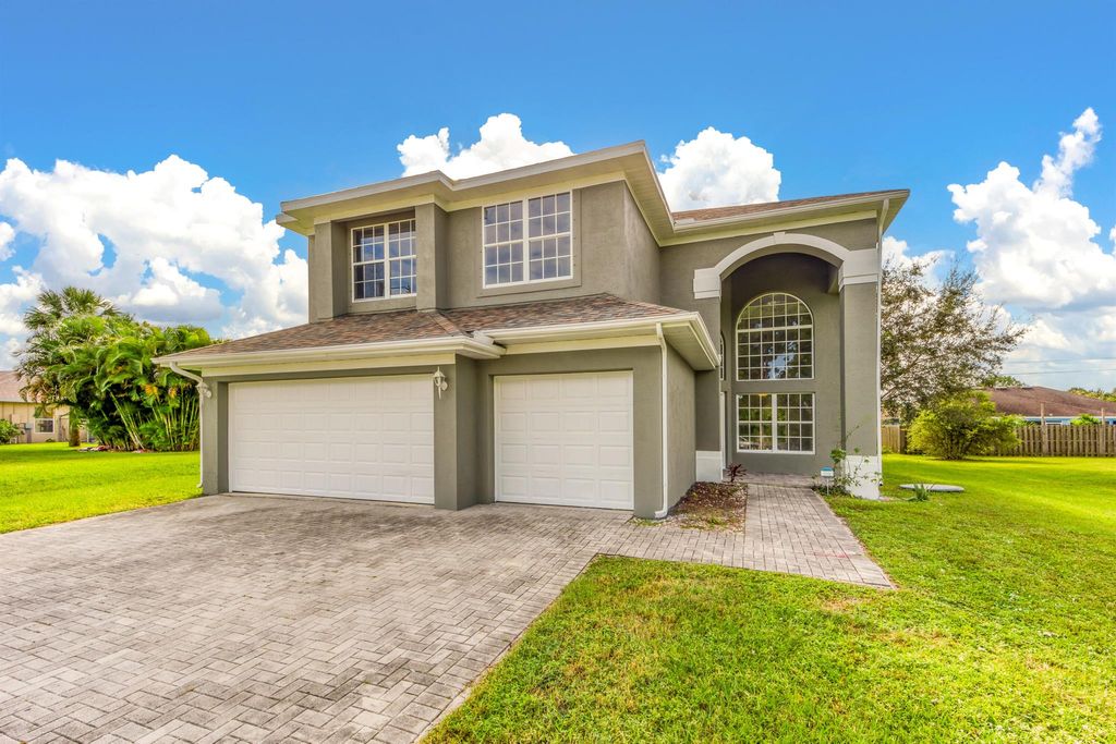 Photo of 1486 SW Devera Avenue, Port St Lucie, FL 34953 (MLS # R10931319)