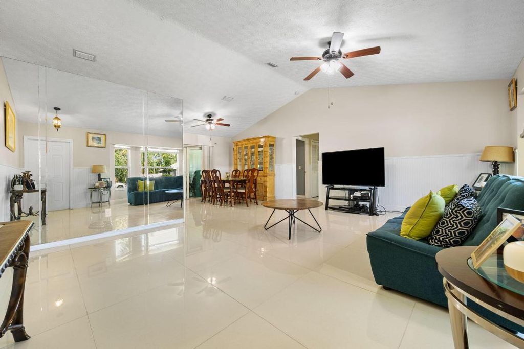 Photo of 932 SE Damask Avenue, Port Saint Lucie, FL 34983 (MLS # R11073620)