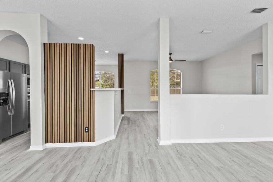 $5,000 CREDIT TO THE BUYER @ CLOSING!!! BEAUTIFULLY RENOVATED 3/2 SINGLE FAMILY HOME WITH AN ''OPEN FLOORPLAN'' THAT SHOWS LIKE NEW!!! NEW ROOF, NEW KITCHEN AND BAR AREA w/ QUARTZ Countertops & A Pantry, NEW Stainless Steel Appliances, NEW Baths, NEW (HVAC) Central AC & Heat, NEW Waterproof Vinyl Flooring Throughout (GRAY), NEW Hot Water Heater, NEW Recessed Lighting, NEW Light Fixtures Throughout, NEW Hurricane Impact Garage Door, NEW Hurricane Impact doors, NEW Washer & Dryer, NEW Ceiling Fans & Fixtures, NEW Paint Inside & Out, HUGE Master Suite W/ A Walk-in Closet, HUGE YARD, Accordion Shutters And SO MUCH MORE!!!! GREAT LOCATION, EAST OF US-1!! Sits on a HUGE 10,000 sq. ft Lot WITH PLENTY OF ROOM FOR A POOL, ETC.!!! Call TODAY To Schedule A Showing!! NO HOA!!!