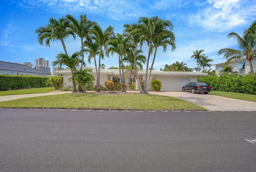 Located in the desirable neighborhood of Palm Beach Isles and one block from the beautiful Singer Island beach this 4 BR 3BA plus office pool home is the perfect place to call home. Fine dining, excellent shopping and the Palm Beach International Airport are all a short drive away. Roof was replaced in 2015, impact windows are 90% complete. Built in 1967    2252 Living square feet
