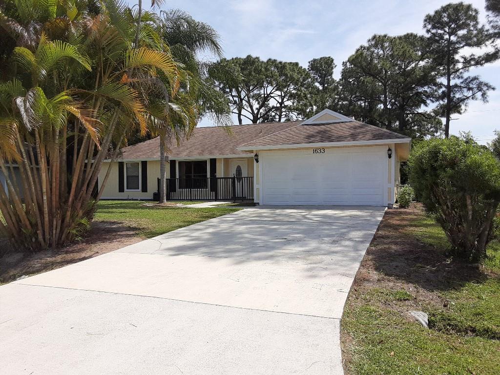 Photo of 1633 SW Cycle St, Port Saint Lucie, FL 34953 (MLS # F10326943)