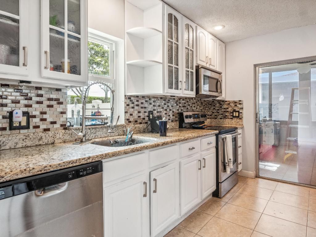 Photo of 8761 Echo Lane, Boca Raton, FL 33496 (MLS # R11064921)