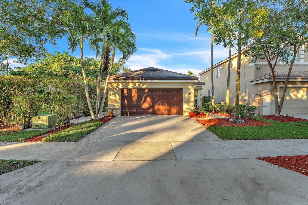 Photo of 1059 Golden Cane Drive, Weston, FL 33327 (MLS # F10555571)