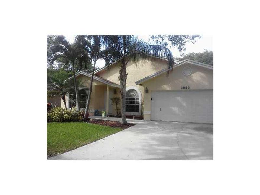 Quiet, home at the end of the cul-de-sac in desirable Coconut Creek. Large  covered screened in patio with plenty of room for entertaining (the Hot Tub stays!) This home also backs the preserve for added privacy! Open floor plan and vaulted ceilings! Sepa rate living room, dining room and family room plus in eat-in-kitchen with breakfast nook! Good sized bedrooms. Rear yard is fully fenced. Close proximity to A rated schools and 54 acre Sable Pines Park! Great Investments.  No rental restrictions
