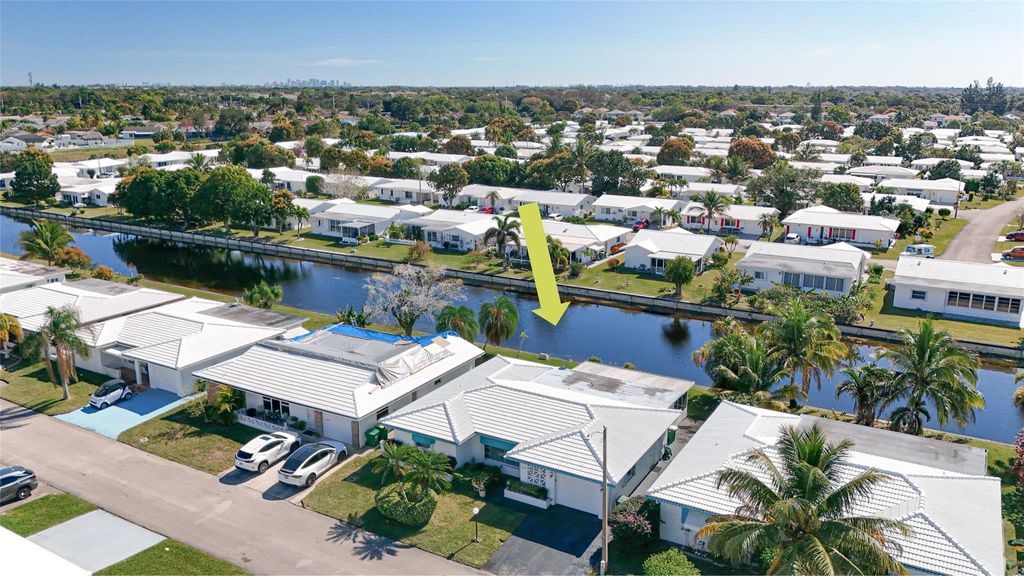 Photo of 6804 NW 74th Pl, Tamarac, FL 33321 (MLS # F10516204)