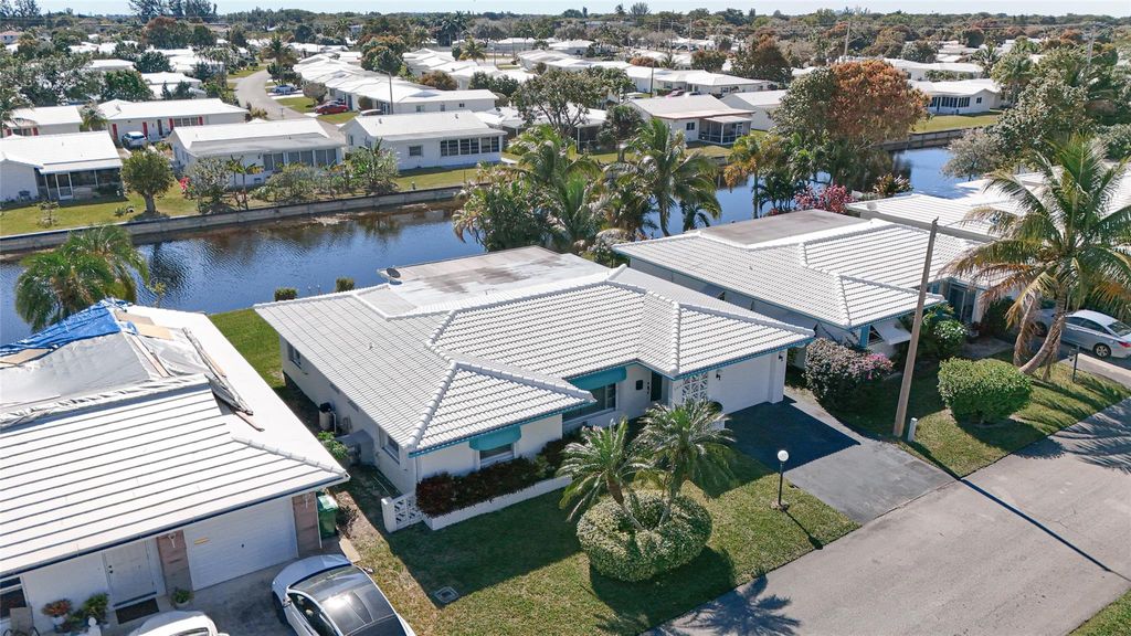 Photo of 6804 NW 74th Pl, Tamarac, FL 33321 (MLS # F10516204)