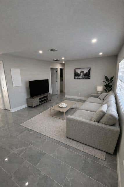 Photo of 520 SW 13TH Place, Deerfield Beach, FL 33441 (MLS # B26067489)
