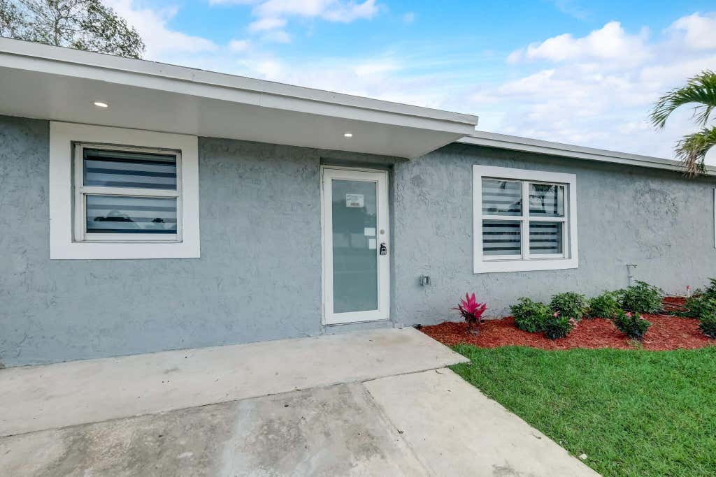 Photo of 520 SW 13TH Place, Deerfield Beach, FL 33441 (MLS # B26067489)