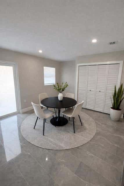 Photo of 520 SW 13TH Place, Deerfield Beach, FL 33441 (MLS # B26067489)