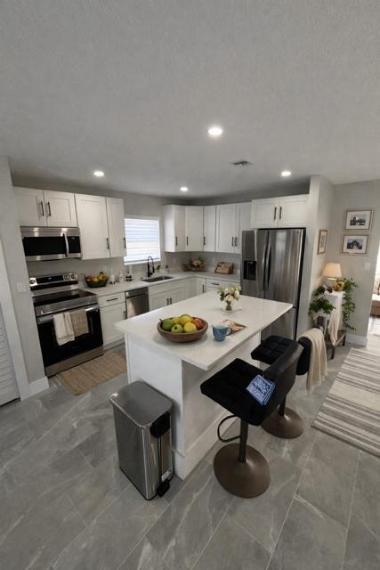520 SW 13TH Place