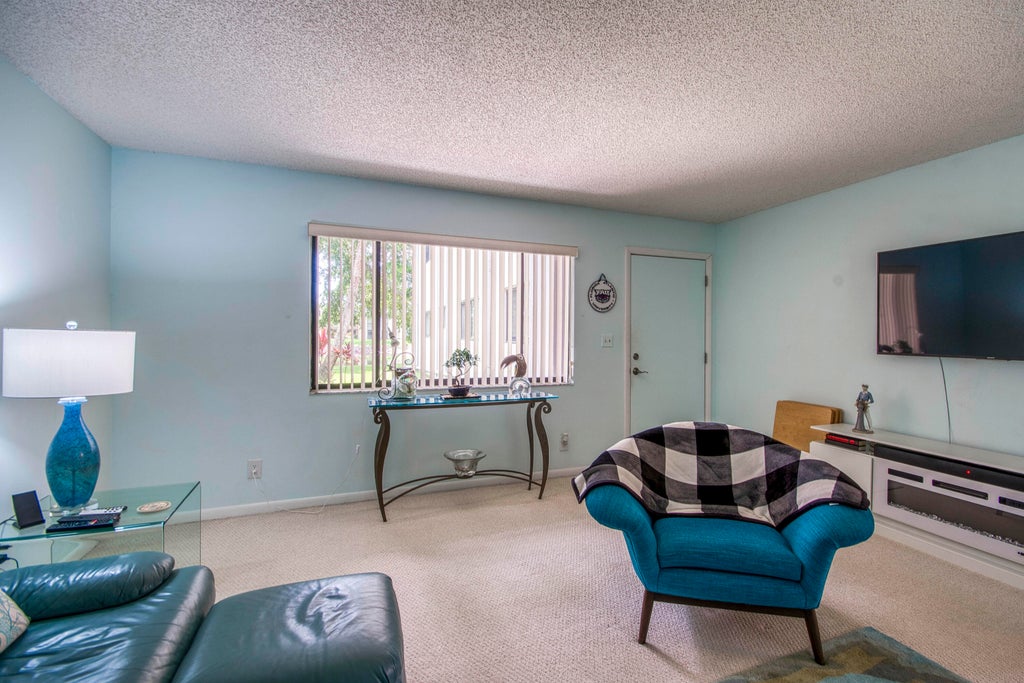 Photo of 15090 Ashland Place #147 E, Delray Beach, FL 33484 (MLS # B26058183)