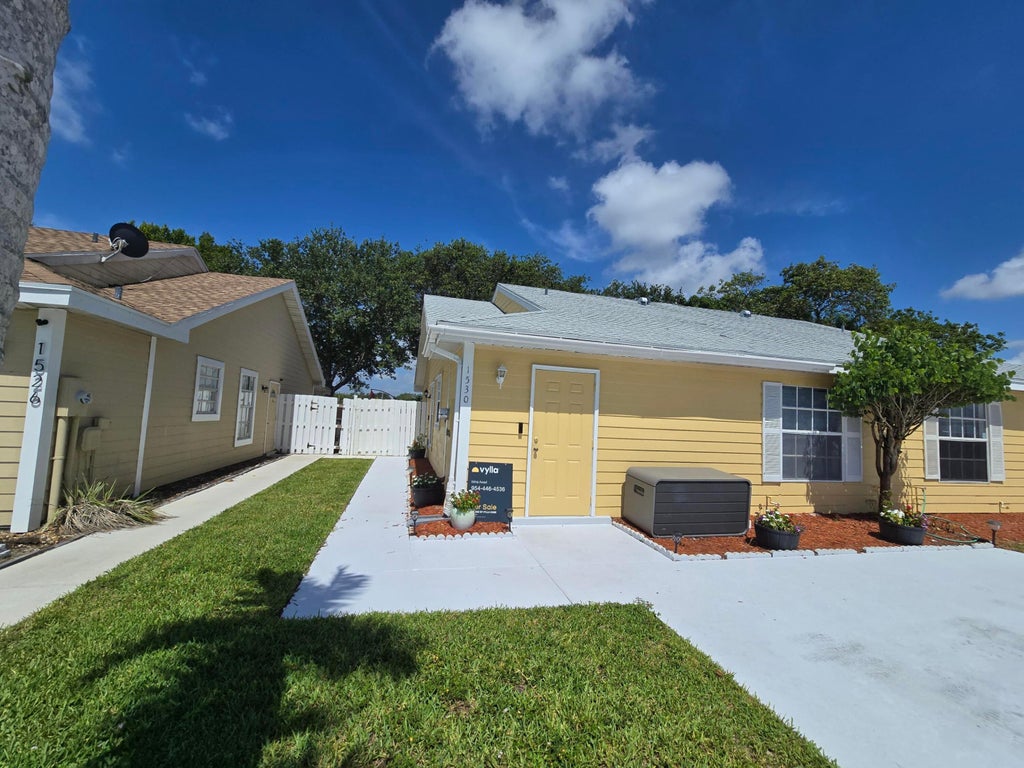 Photo of 1530 Royal Forest Court, Palm Springs, FL 33406 (MLS # B26043319)