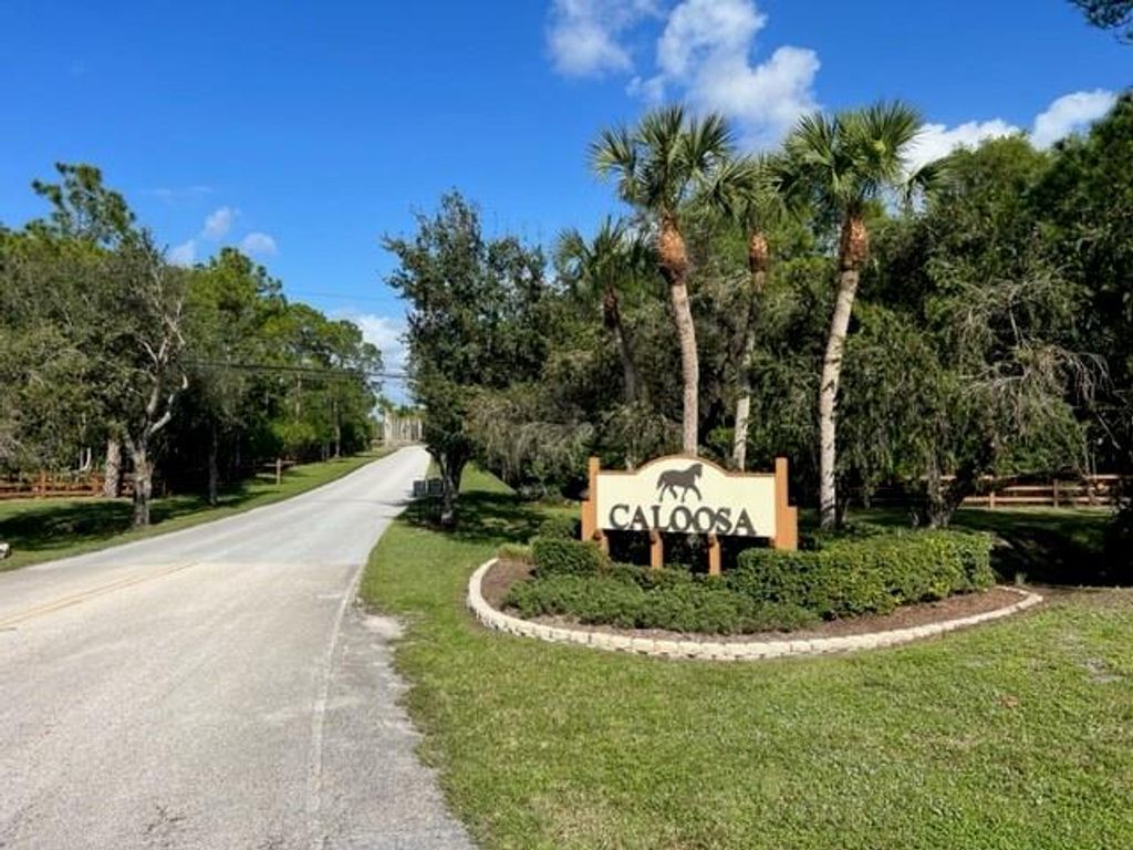 Photo of 14620 Broken Wing Ln, West Palm Beach, FL 33418 (MLS # F10376621)