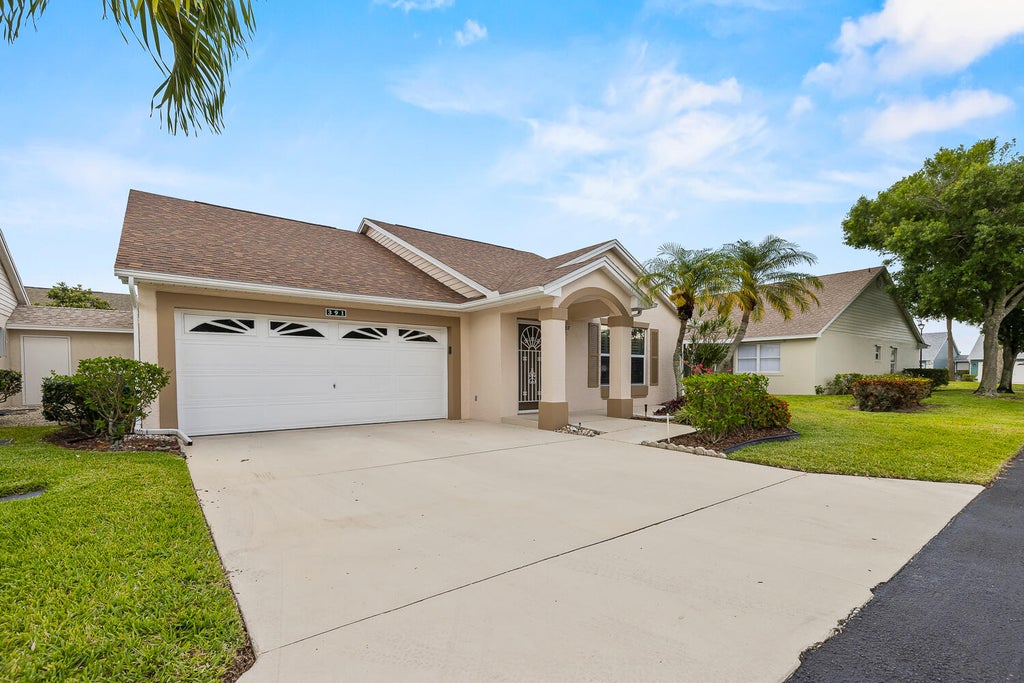 Photo of 391 NW Sherry Lane, Port Saint Lucie, FL 34986 (MLS # R10984331)