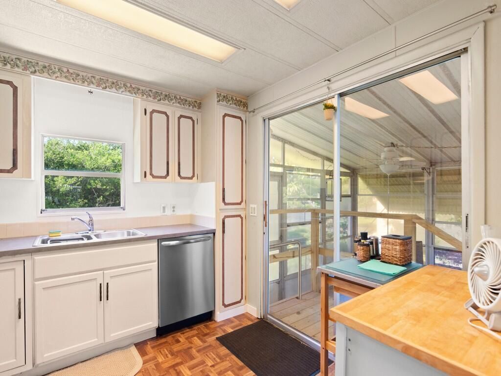 Photo of 521 NE Sapphire Lane, Jensen Beach, FL 34957 (MLS # R11072909)