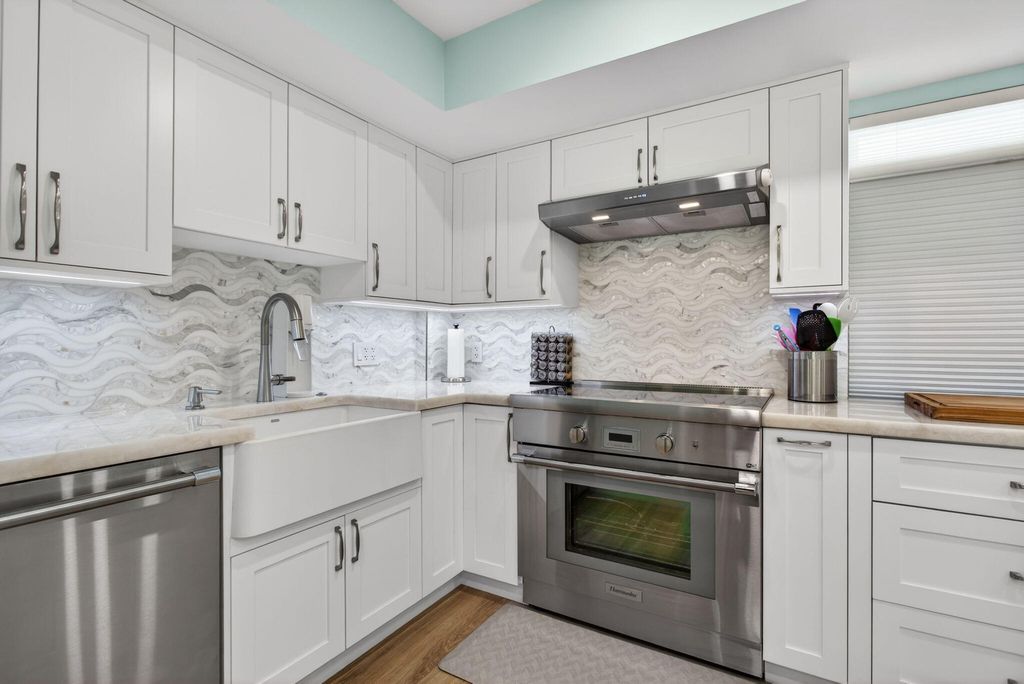 Photo of 3100 NE 48th Court #214, Lighthouse Point, FL 33064 (MLS # B26027572)