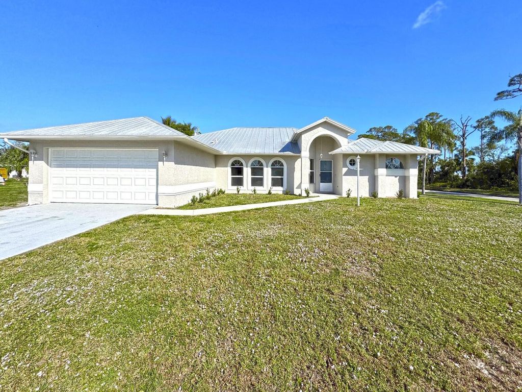 Photo of 6502 Lakeland Boulevard, Fort Pierce, FL 34951 (MLS # R11061700)