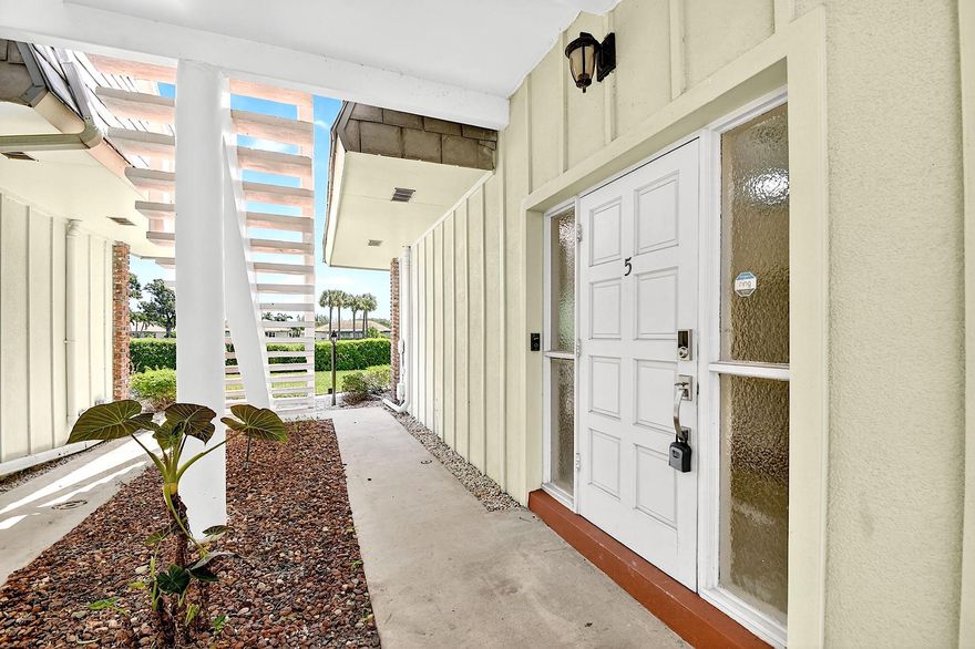 Don't just View & Save it — come see it. The pictures don't fully capture the vibrant energy and feel this unit offers in person.

Located in one of Atlantis' quietest sections, this ground-floor Tudor-style condo backs directly to the golf course with desirable northern exposure for softer light and better energy efficiency. 

Recently updated with an open kitchen, upgraded finishes, smooth ceilings (no popcorn), and refreshed baths, it offers a bright, move-in ready feel. The large screened patio overlooks the fairway and can be converted into a Florida room for added living space. 

2BR/2BA, 1,384 total SF. Light seasonal use. No pending assessments. Strong reserves. Quiet, stable community. Lock-and-leave value with character.