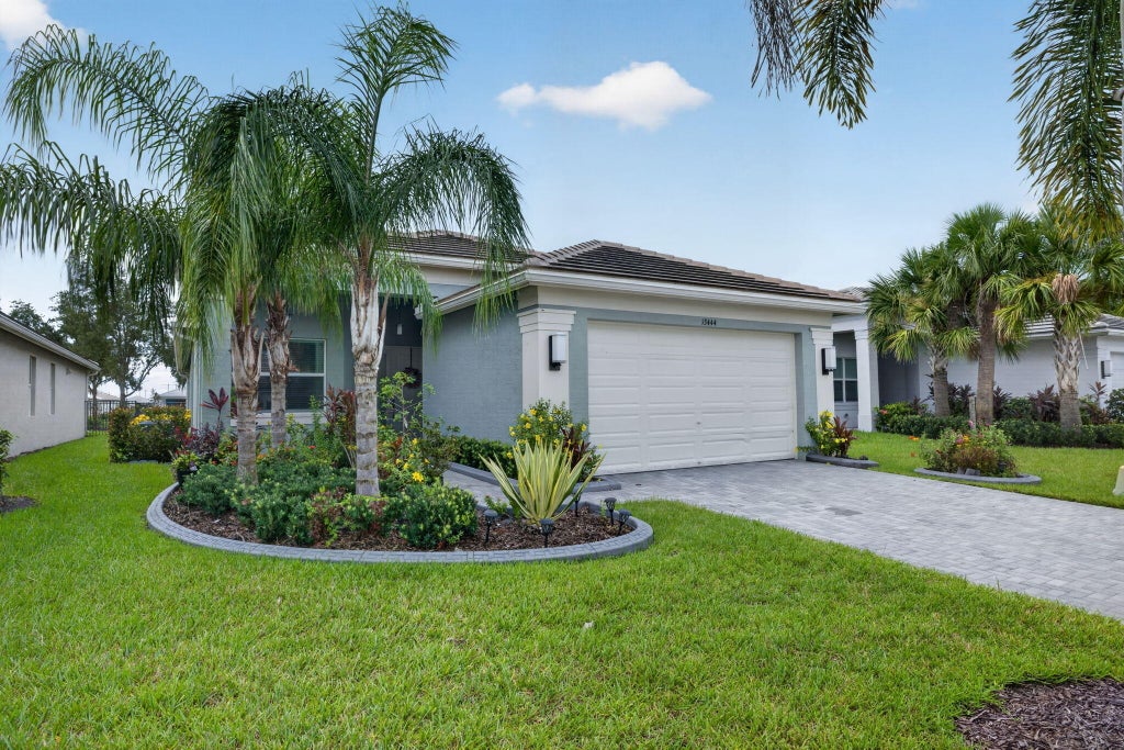 Photo of 13444 SW River Rock Road, Port Saint Lucie, FL 34987 (MLS # B26074622)