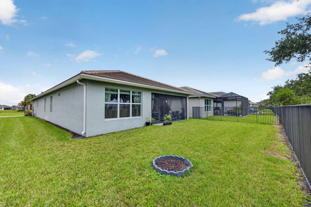 Photo of 13444 SW River Rock Road, Port Saint Lucie, FL 34987 (MLS # B26074622)