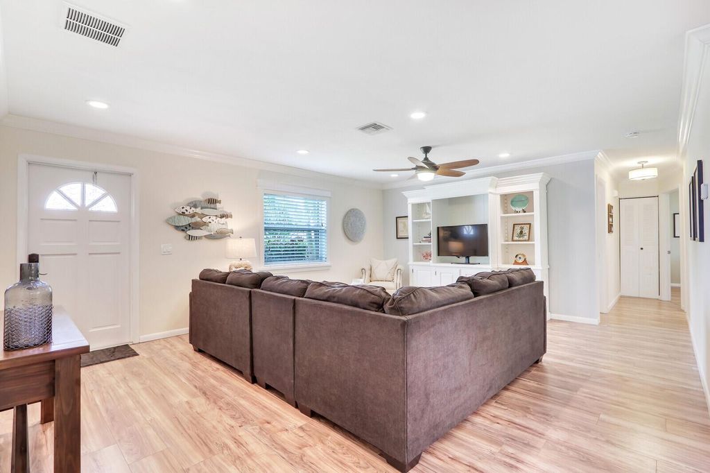 Photo of 1110 NE Crescent Street, Jensen Beach, FL 34957 (MLS # R11009363)