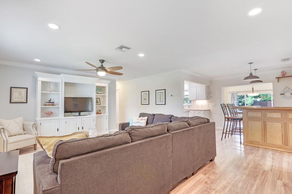 Photo of 1110 NE Crescent Street, Jensen Beach, FL 34957 (MLS # R11009363)