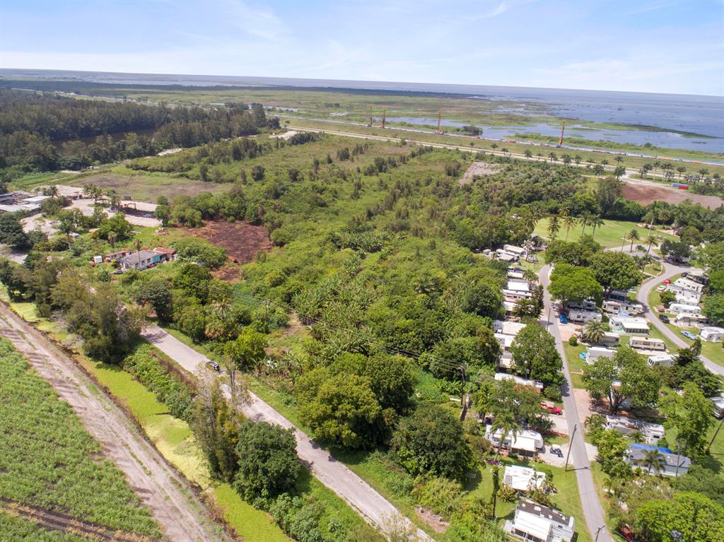 Welcome to your very own agrihood! This 5 acre parcel has been waiting for you -- AND you can owner finance! Yes! You read that right! Contact us for specifics while this is still available. Build your dream farm, stable, multi-generational compound, retreat, campgrounds, and more. Check additional docs for article on the incredible Bass Pro Shop 99 acre destination resort w/ hotel, fishing + glamping campgrounds in process on just the other side of Lake Okeechobee. The timing is right! Lot is zoned agricultural production and it can be purchased with an additional 14.125 acres 1 street over on US 27. Under the ''docs'' section, you'll find more information on property zoning. Priced at under 30,000/acre, don't let this slip away.Click on ''more'' for a list of eligible land uses.