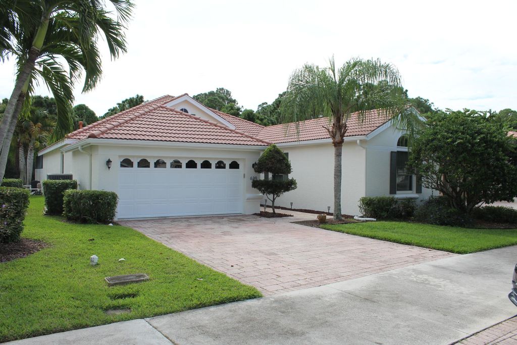 Photo of 639 SW Lake Charles Circle, Port Saint Lucie, FL 34986 (MLS # R11079284)