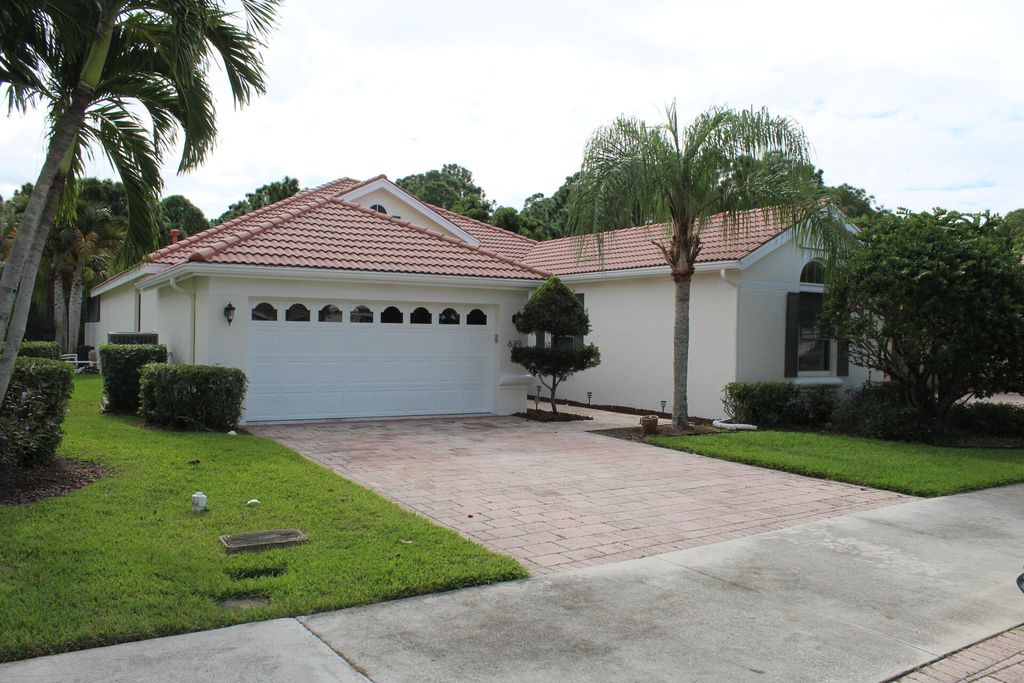 Photo of 639 SW Lake Charles Circle, Port Saint Lucie, FL 34986 (MLS # R11079284)