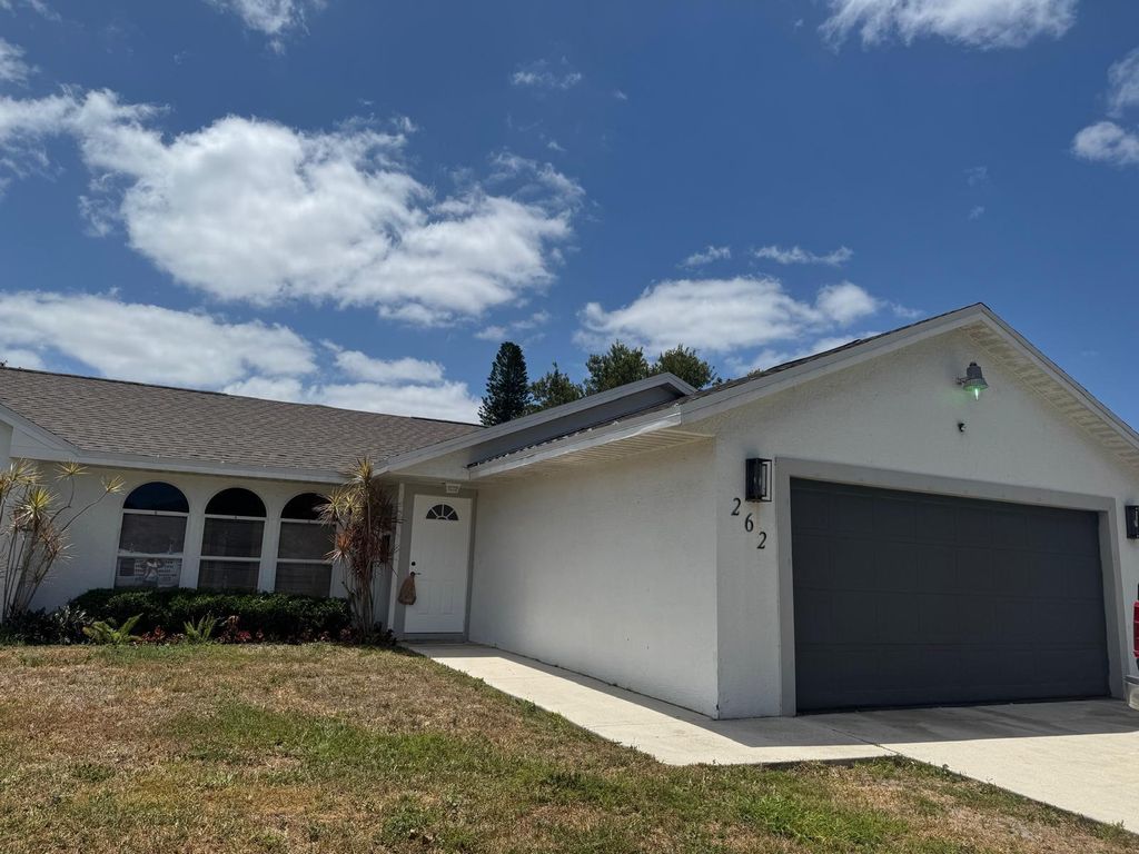 Photo of 262 SW Crescent Avenue, Port Saint Lucie, FL 34984 (MLS # B26006027)