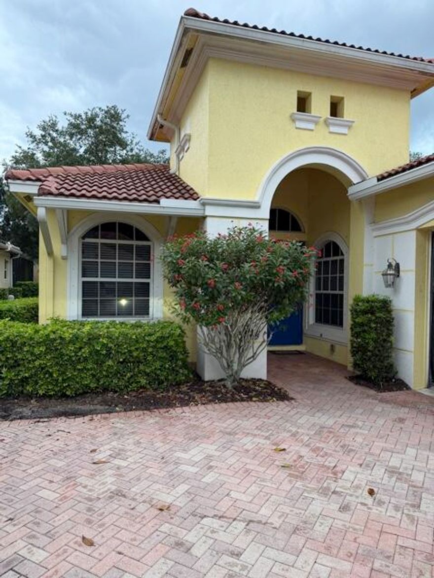 Located on a quiet and private street within the highly desirable PGA Village, this beautifully maintained and spacious 3-bedroom, 2-bathroom home offers the perfect combination of comfort, elegance, and resort-style living. From the moment you step inside, you'll be greeted by soaring high ceilings, abundant natural light, and an open-concept floor plan designed to maximize both space and functionality. Beautiful tile flooring flows throughout the main living areas, creating a clean and sophisticated look while making everyday maintenance a breeze. The expansive living and dining areas seamlessly connect to the kitchen and outdoor living space, making this home ideal for both entertaining guests and enjoying peaceful evenings at home. Large sliding glass doors lead to a covered and screened patio where you can relax with your morning coffee, unwind after a long day, or enjoy the privacy and tranquility of the surrounding neighborhood year-round. The spacious layout provides comfortable bedroom accommodations, generous storage, and a thoughtfully designed floor plan that perfectly suits both seasonal and full-time living.  As a resident of PGA Village, you'll enjoy access to the renowned PGA Island Club, offering world-class amenities including resort-style recreational facilities, fitness amenities, social spaces, and access to championship golf opportunities. This premier community is known for its beautifully maintained surroundings, peaceful atmosphere, and exceptional lifestyle amenities.  Cable and internet are included in the rent, providing added convenience and value, while the tenant is responsible for electric and water utilities. Ideally located close to shopping, dining, entertainment, medical facilities, and major highways, this exceptional home offers the best of Florida living in one of the Treasure Coast's most sought-after golf communities.